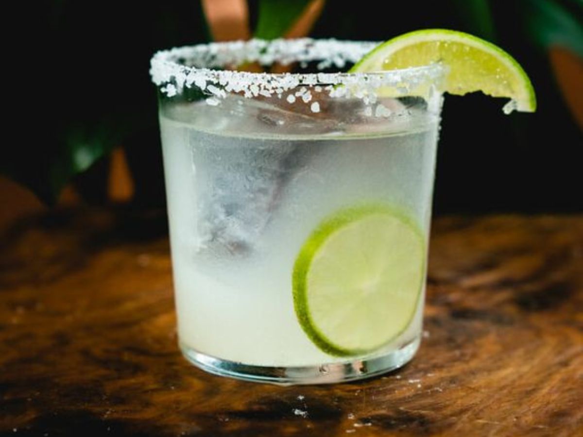 Classic Margarita Cocktail with Lime Slice and Salt Rim